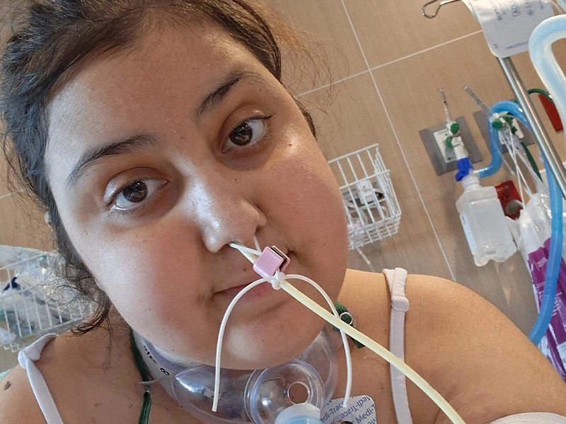 Selfie of a teenage girl who is intubated