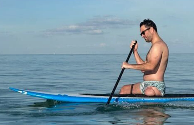man in canoe
