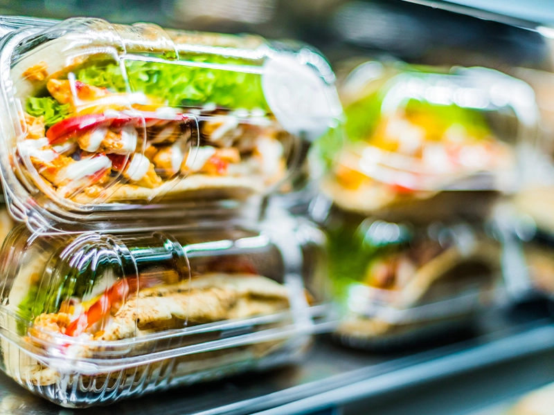 image of sandwich packed in plastic displayed in supermarket refrigerator
