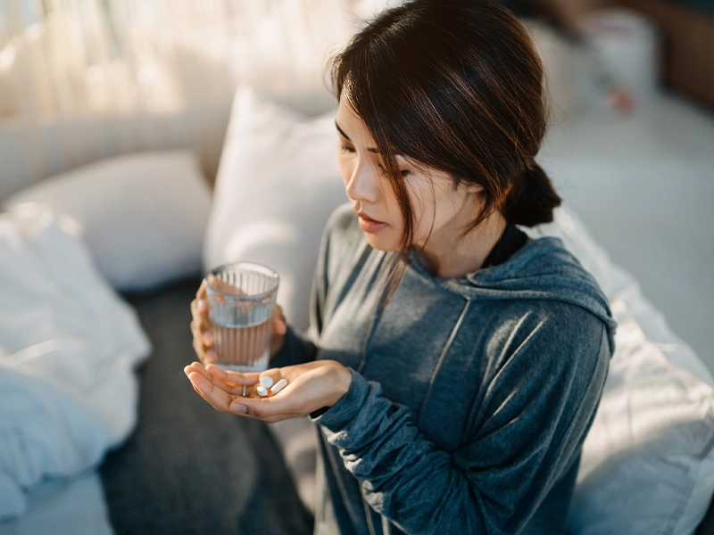 woman drinking a cup of tea