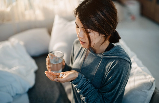 woman drinking a cup of tea