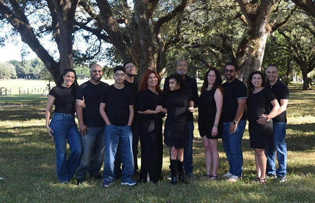 family photo, all dressed in black