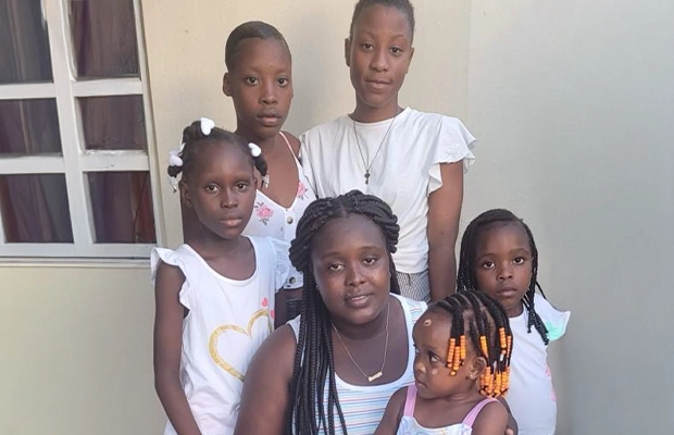 family photograph of children and teenagers