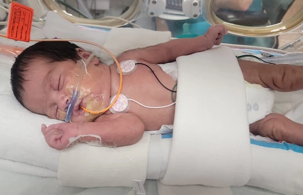 baby in incubator