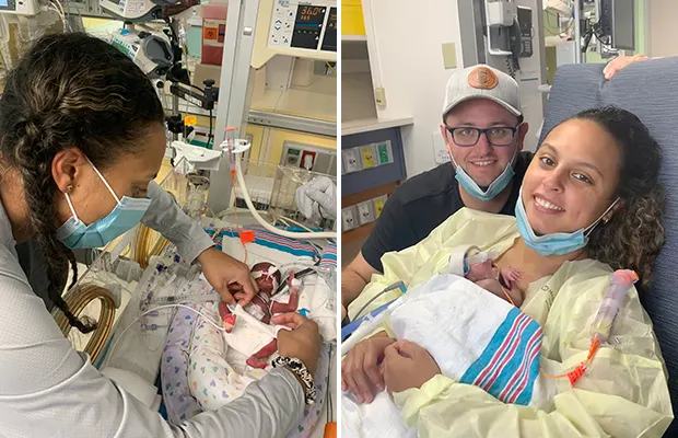 Parents with their young baby in a NICU room