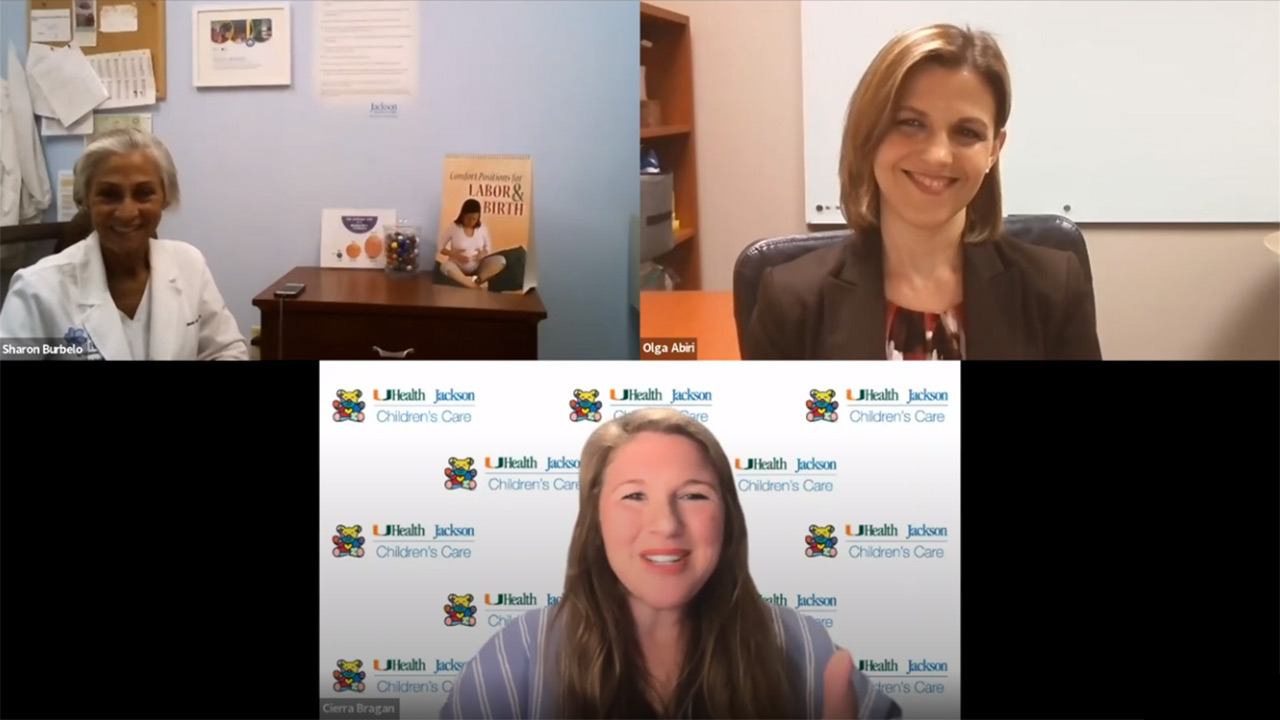 A digital call between three professionals