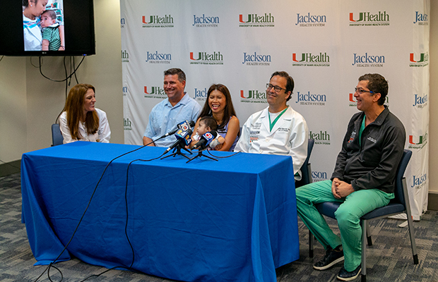 Michael David Antonio Angelo with his mother, father, and his multidisciplinary team at a press conference