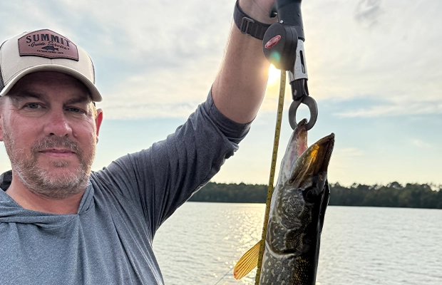 selfie of a man who just caught a fish