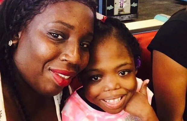 woman posing with her daughter