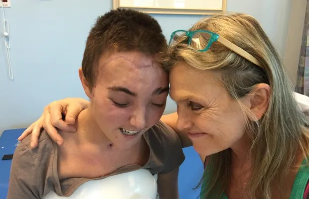 two women hugging in the hospital