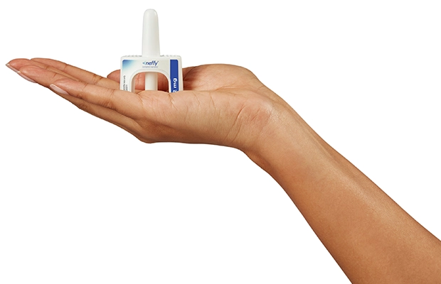 image of hand showing inhaler