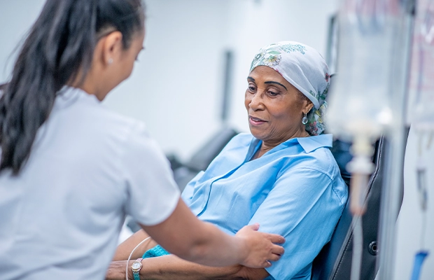 female doctor checking female patient