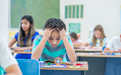 frustrated boy in class
