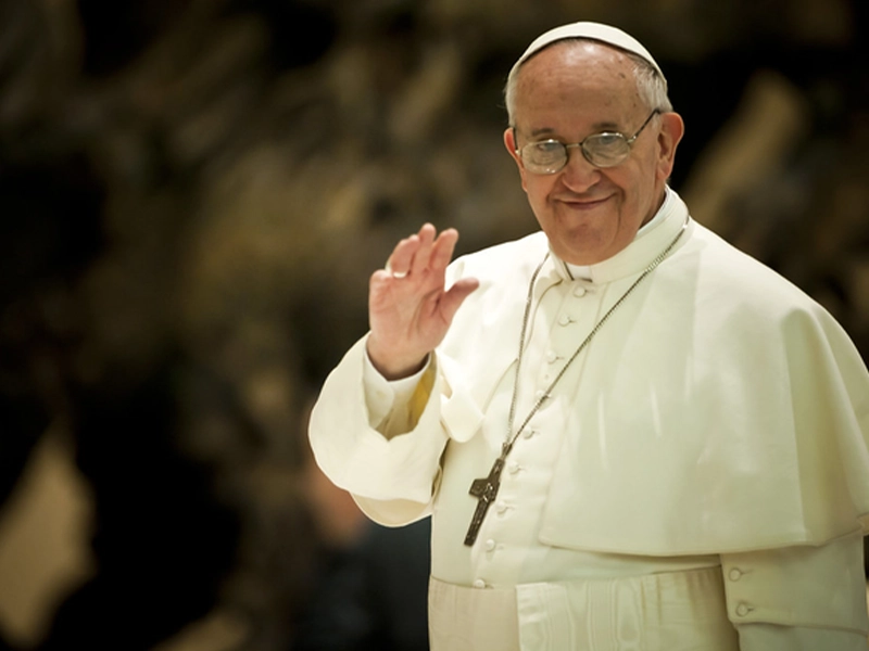 photograph of pope Francis greeting