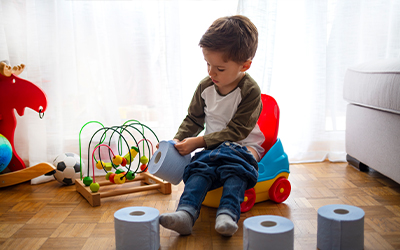 boy sitting on potty training