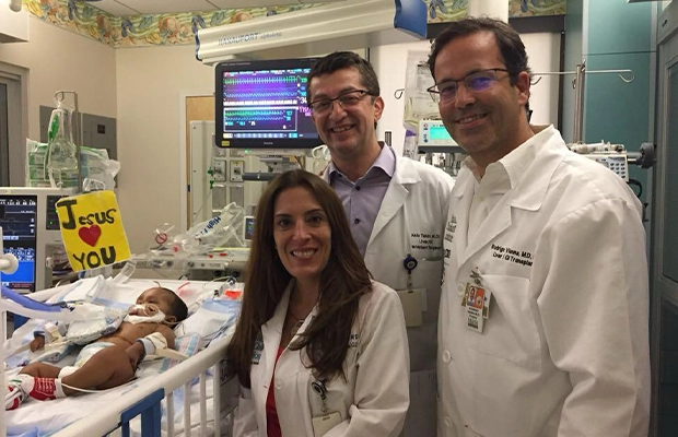 doctor with the child's parents