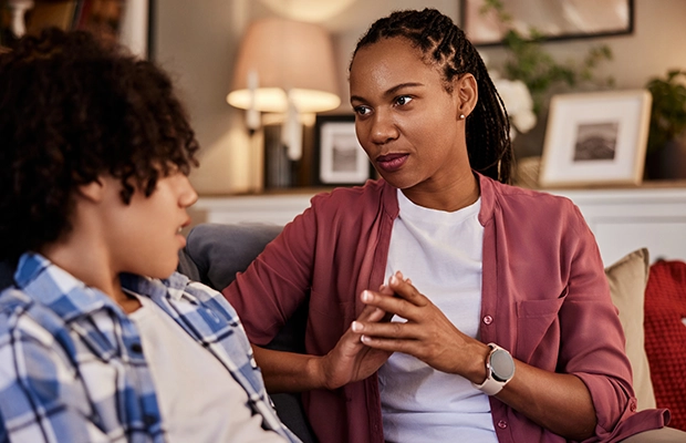 image of a woman talking to her son