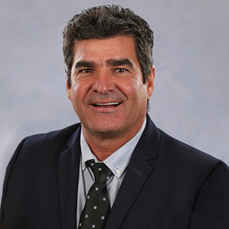 Close-up of a man wearing a tie.