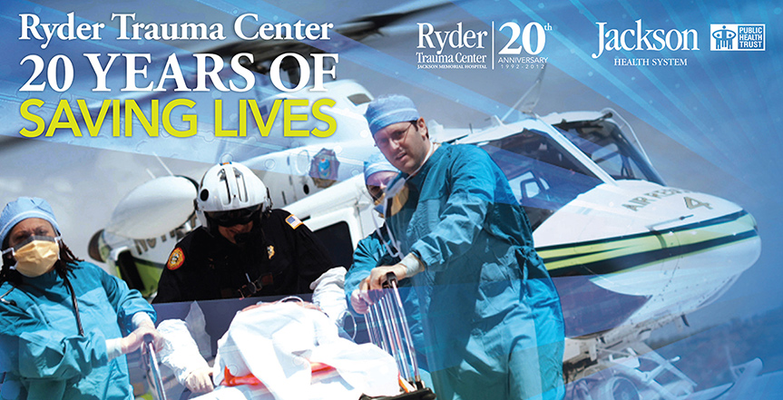 Physicians bringing in a patient from a helicopter, Ryder Trauma Center 20 years of Saving Lives is written over the image