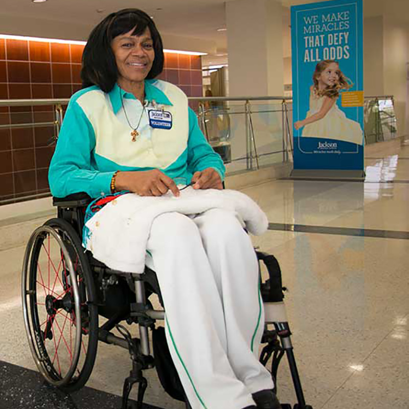 Herminie Eyma Pedro Medina sitting in a wheelchair in the hospital