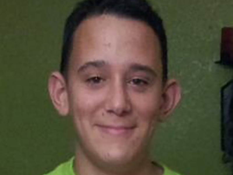 A closeup of Yasser Lopez smiling