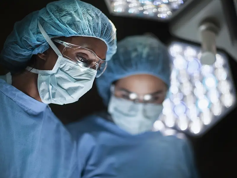 Closeup of surgeons performing surgery