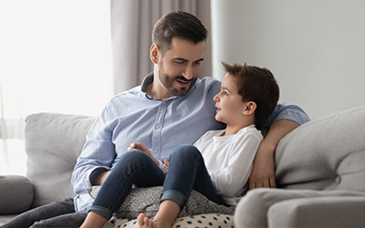 father and son talking