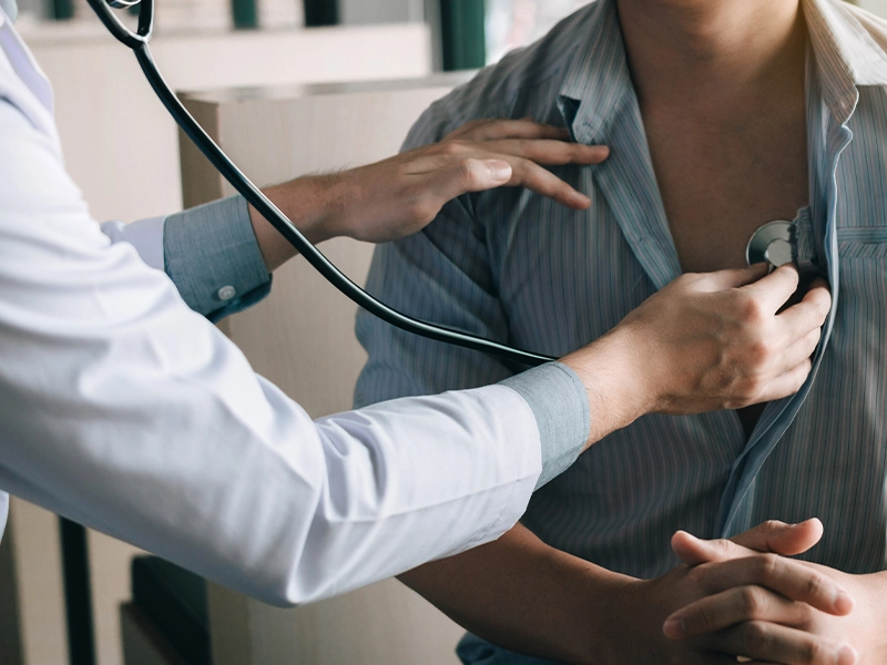 Close-up of a man being examined by a doctor