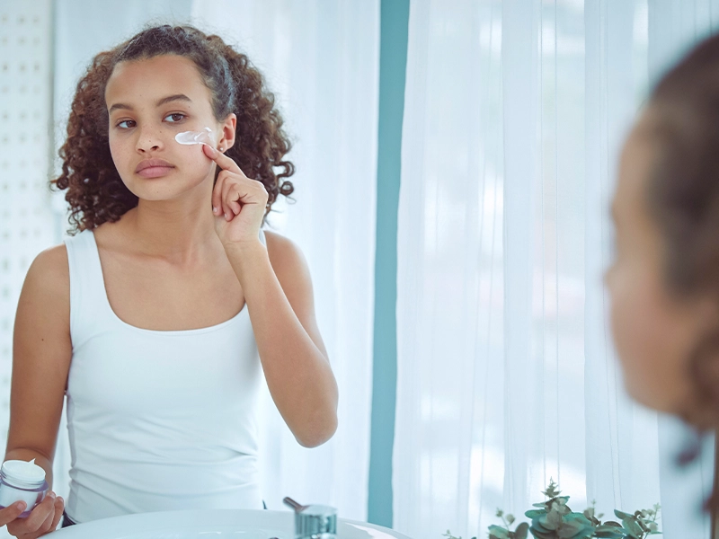 woman getting skin care