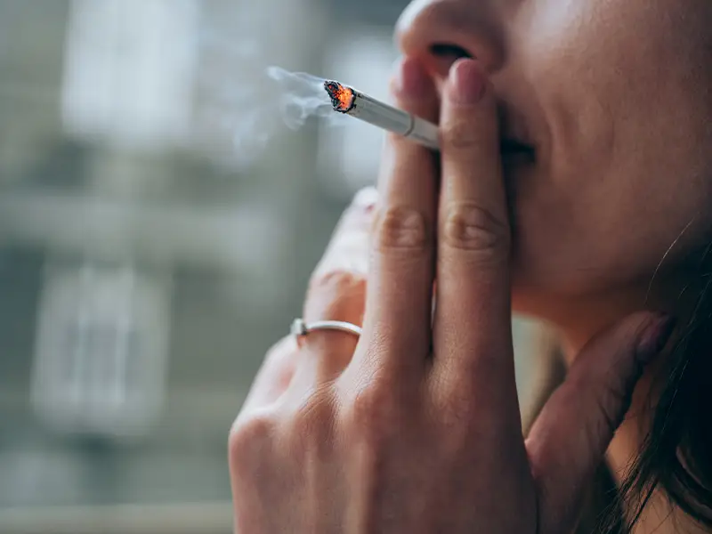 Close-up of a woman smoking