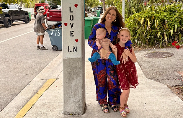 photograph of a woman with her children