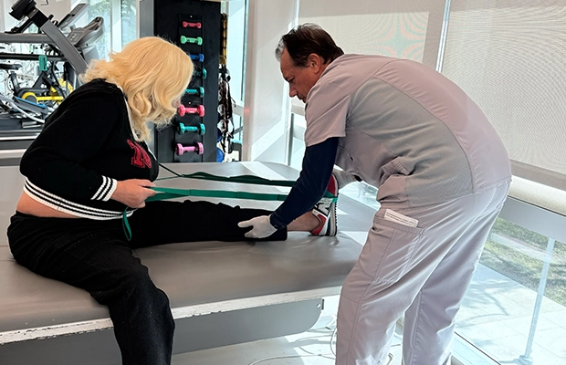 woman undergoing therapy with a doctor