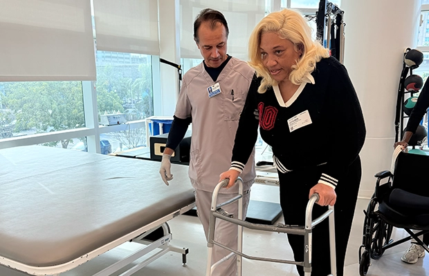 woman undergoing therapy with a doctor
