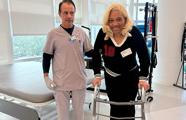 Woman exercising on a gym machine
