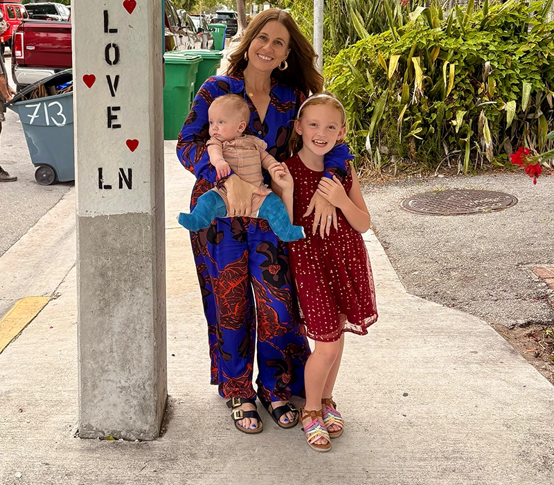 photograph of a woman with her children