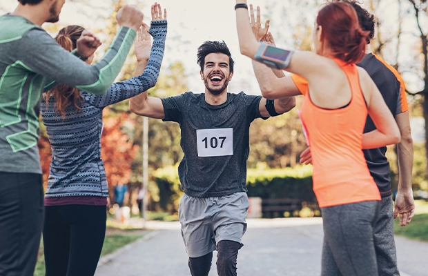 happy man finishing marathon
