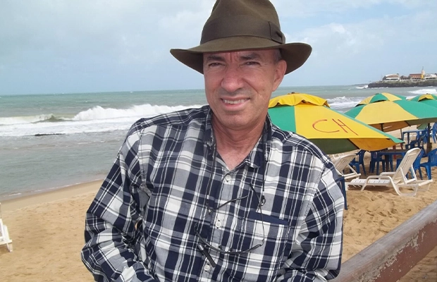 closeup of man wearing hat