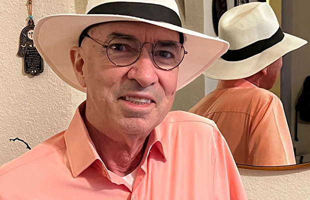 closeup of man wearing hat