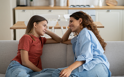 Woman and girl chatting