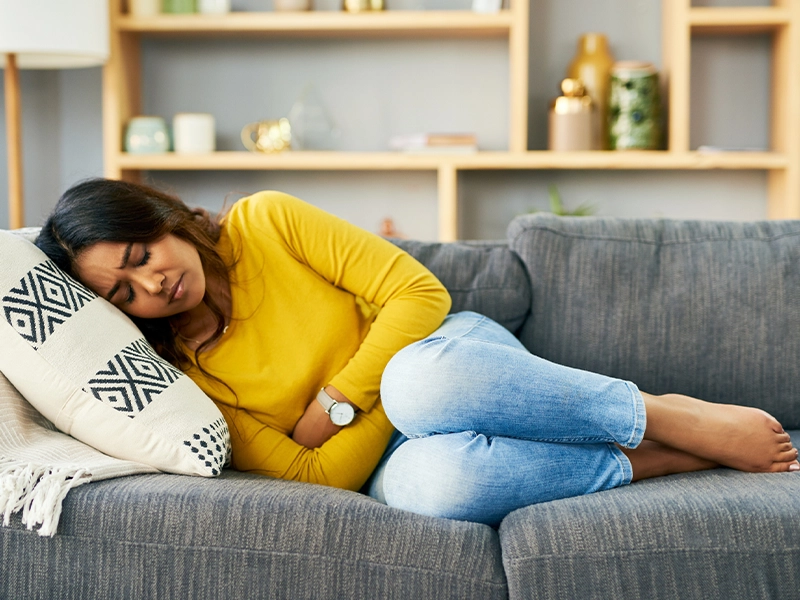 woman feeling strong cramps