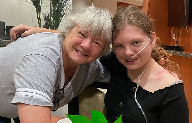 Two women smiling at the camera