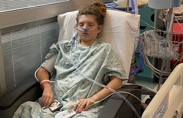 A person in a hospital bed