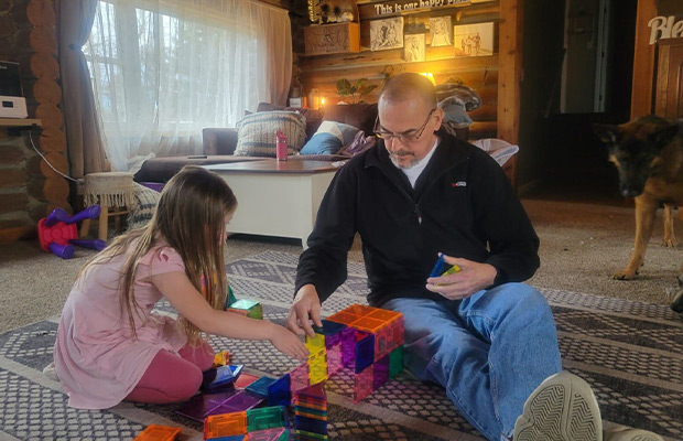 Man playing with a girl