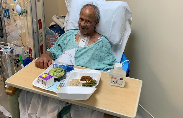 man lying on hospital gurney