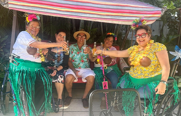 family in hawaiian costume