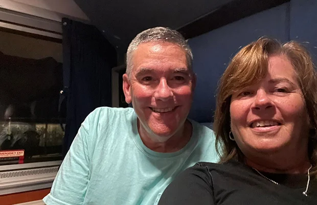Close-up of couple smiling at camera