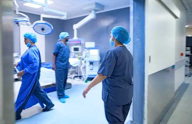 photograph of doctors in the operating room