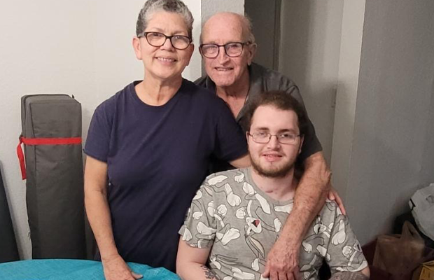 family posing to the camera