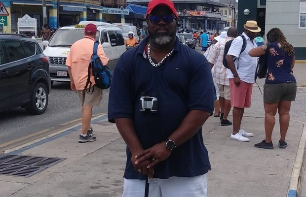 man walking with cane