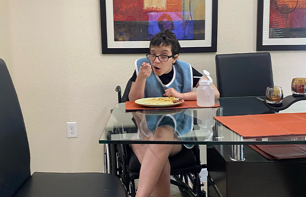 sitting woman eating something